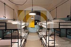 Two-level beds inside dormitory room for students