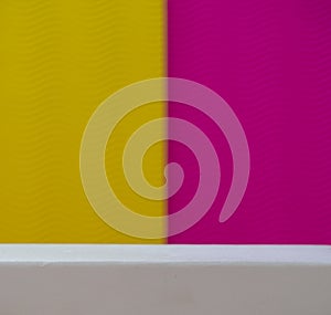 Two-level pink-yellow with white pedestal background