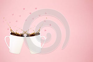 Two levitating coffee mugs with splashes and heart confetti. Coffee concept. Minimal art trend. Solid pink background