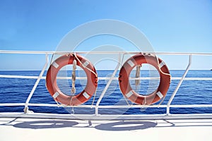 Two lifebuoys on the background of the sea, vacation, beach, yacht, tan, safety, r