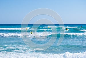 Two lifeguards in action for an emergency