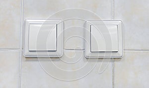 Two light switches in ON position