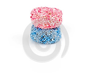 Two liquorice allsorts candy isolated on white background