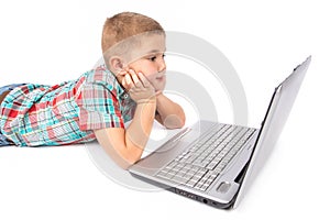 little boy using a laptop