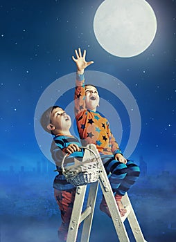 Two little brothers catching the moon