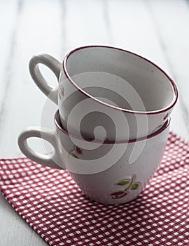 Two little cups on table