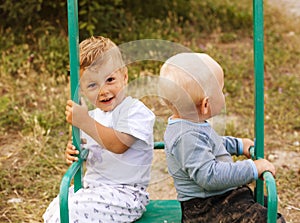 Two little cute boy playing