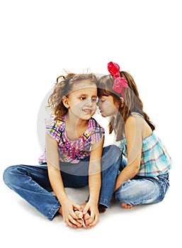 Two little girls are chatting