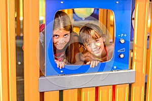 Two little girls playing on the playground