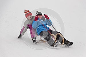 Two little girls in winter activity