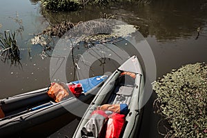 Two loaded boats moored ashore after rafting.