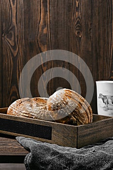 Two loafs of artisan whole grain wheat bread