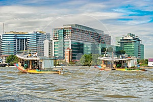 Houses along the Chao Phraya river in Bangkok, Thailand.