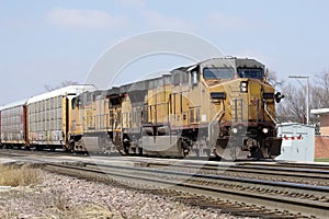 Two locomotives with a freight train