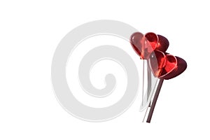 Two lollipops. Red hearts. Candy. Love concept. Valentine day