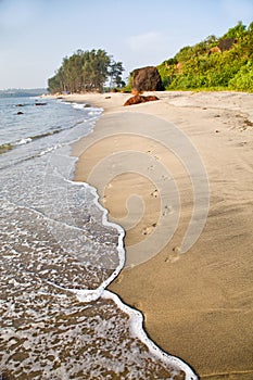 Two lonely footprints on a beach