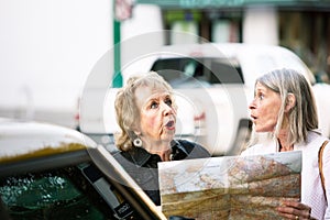 Two Lost Senior Women Checking a Map