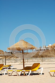 Two lounges on the beach