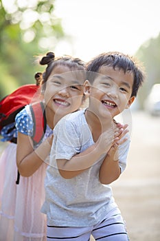 Two lovely asian children boy and girl with kidding smiling face