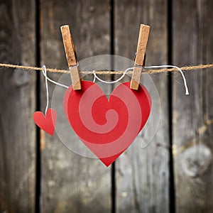 Two lovely red hearts on the clothesline.