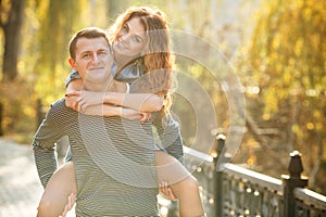 Two lovers in the autumn park