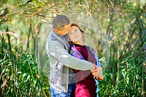 Two lovers stroll in the open air