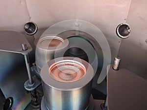 Two magnetron sputtering sources with two inch copper and titanium targets