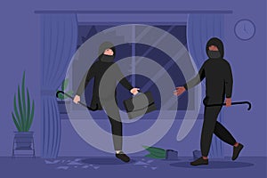 Two male burglars in masks and hoodie breaking in house or apartment