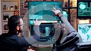 Two male hacker making their attack plan