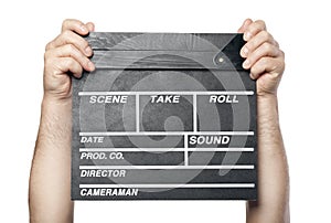 Two male hands holding movie production clapper board isolated