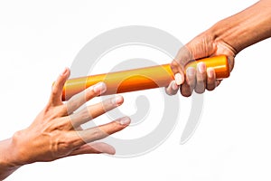 Two male hands passing a relay baton