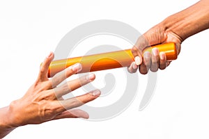 Two male hands passing a relay baton photo
