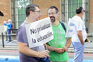 Two protesters during the Ã¢â¬ÅGreen TideÃ¢â¬Â demonstration against the pillage of education public money, Madrid Spain