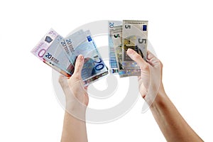 Two man's arms are holding euro money bills