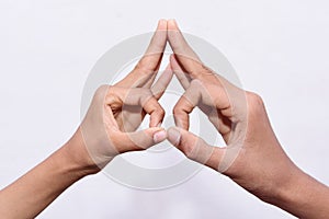 Two man's hand gestured funny eye showing symbol photo