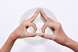 Two man's hand gestured funny eye showing symbol photo