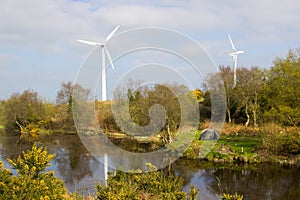 A two man tent pitched on a piece of ground beside the lake at the old lead mines workings in Conlig, County Down in N Ireland