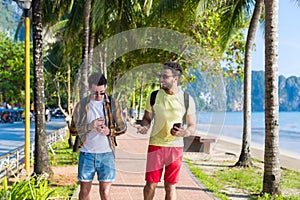 Two Man Using Cell Smart Phones Tropical Park Couple Chatting Online Holiday Sea Summer Vacation