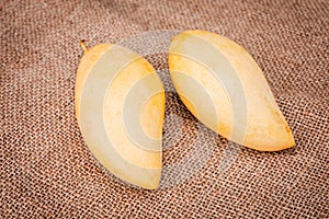 Two mango on sackcloth
