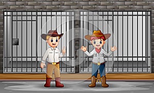 Two mans guarding a prison cell