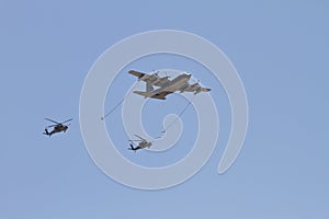 Two Marine HH-60 Pave Hawks preparing to refuel