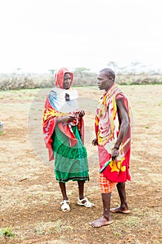 Two Massai men walking together