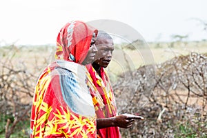 Two Massai men walking together photo
