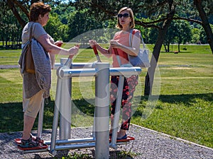 Two Mature women decided to work out on the simulators