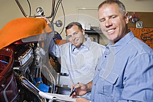 Two Mechanics At Work