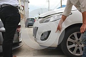 Two men argued after car crash on city street, Accident concept photo