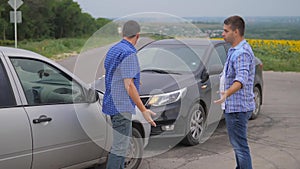 Two men arguing conflict after a car accident on the road car insurance. slow motion video. Two Drivers man Arguing