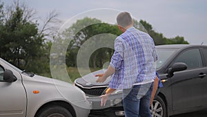 Two men arguing conflict after a car accident on the road car insurance. slow motion video. Two Drivers man lifestyle