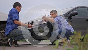 Two men arguing conflict lifestyle after a car accident on the road car insurance. slow motion video. Two Drivers man