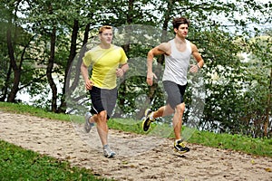 Two Men Athletes Running / Jogging